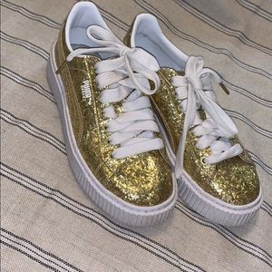 Puma gold glitter shoes